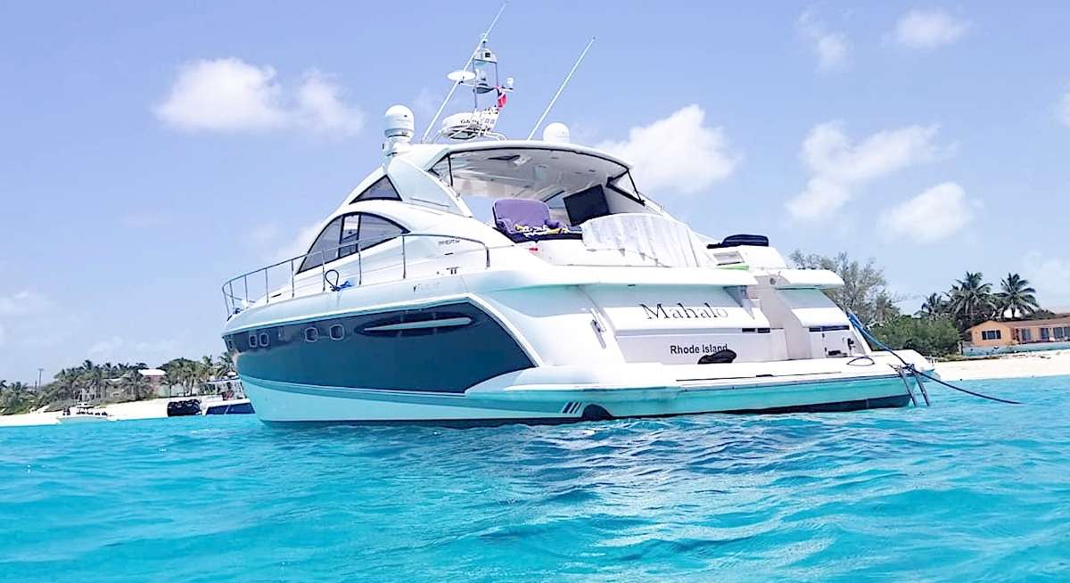 Boat with vinyl graphic in beach